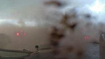 Here's a look at storm chasers caught inside passing tornado