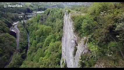 Nail-biting footage shows UK family teeter along 300ft-high 'Giddy Edge' footpath
