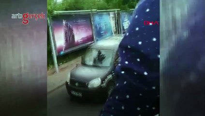 Uber sürücüsü aracının üstünde otoparka götürüldü