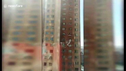Powerful winds rip off building walls in north China, injuring one