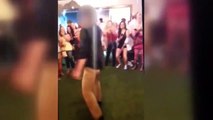 Un policier du FBI fait tomber son pistolet en dansant dans un club... Oups
