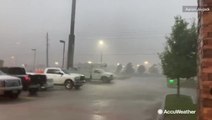Squall line blasts through parking lot