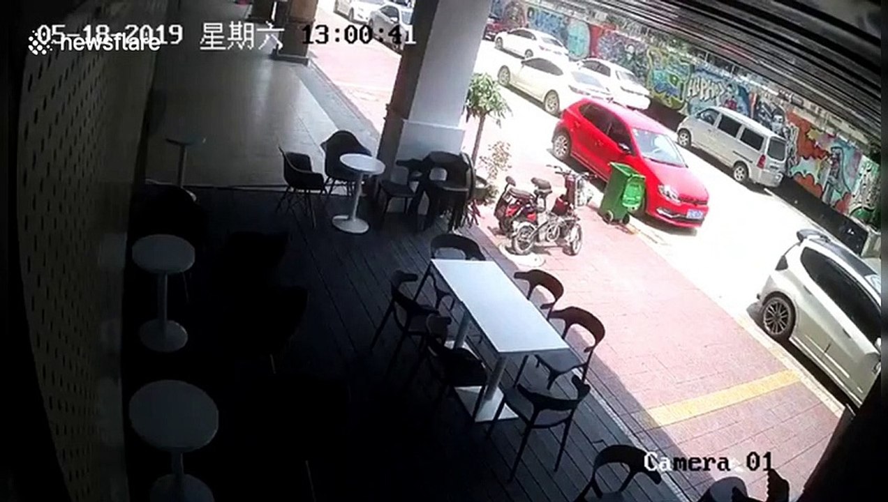 Wall collapses and damages 13 parked cars in China's Guangdong