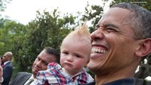 21 Pictures of President Obama Holding Babies