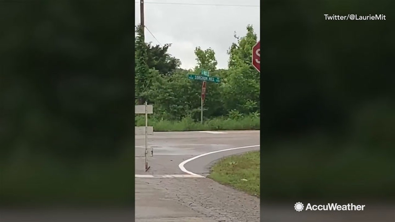Road in ruins after being destroyed by flooding