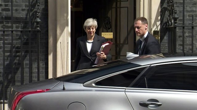 Theresa May departs Downing Street for PMQs