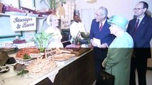 The Queen learns to use a self-service check-out