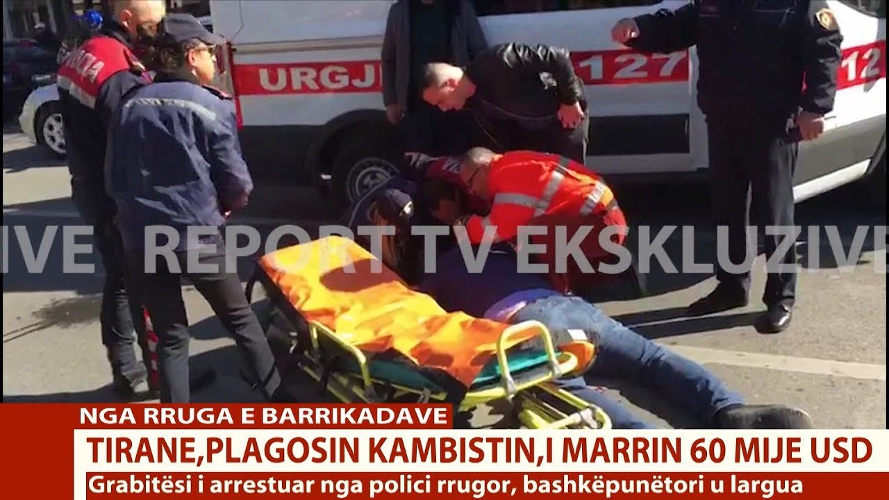 Report TV - I marrin 60 mijë $ dhe e plagosin me thikë, pamjet e grabitjes në Tiranë