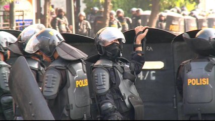 Deadly protests continue in Indonesia after Jokowi's election win