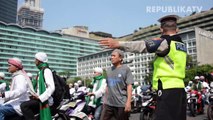 Polisi dan Massa Aksi Damai Shalat dan Buka Puasa Bersama