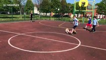 'Lionel Messi of Dogs' runs rings around a group of young football players in Ireland