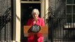 Tearful Theresa May announces resignation
