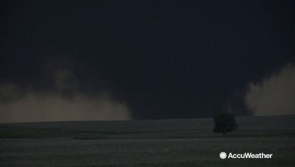 Large wedge tornado swirls ominously at night