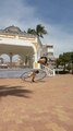 Guy Flips Expertly Over Acrobat Doing Tricks on Gym Wheel