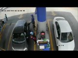 Cámaras graban el momento en que un despachador de gasolina es asaltado y le disparan