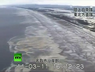 Tsunami in Japan - An amazing footage of the waves about to strike the cost