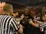 Triple H attacks Undertaker and gets arrested