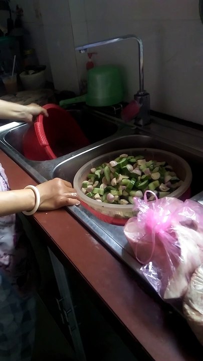 Mum in the kitchen in Vietnam.....