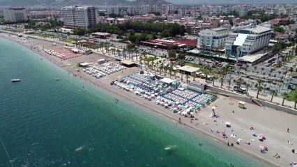 Turistler sahilleri doldurdu - ANTALYA