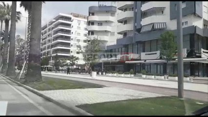 Report TV - Vlorë, përplasje me armë zjarri te Lungomareë, një i plagosur