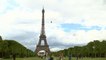 Thrill-seekers take 90 kph zipline ride off Eiffel Tower