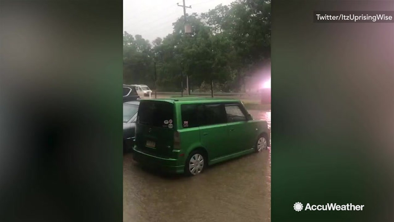 Cars stranded in rising flood waters