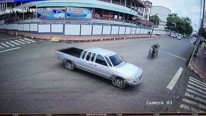 Moped rider lands safely inside bed of pick-up truck following collision