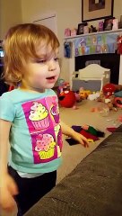 Genevieve singing "If You're Happy and You Know It!"