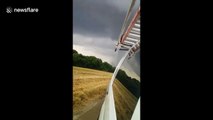 ''It's coming our way!'' Texas driver speeds away from ominous tornado