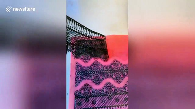 Chinese baker sculptures giant cake into amazing wedding dress