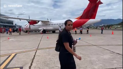 Hundreds forced to flee Honduras international airport as police use tear gas on protesters