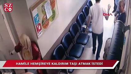 Hamile hemşireye kaldırım taşı atmak istedi