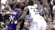 NBA BASKETBALL - Shaquille O'Neal dunks on Dikembe Mutombo