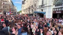 Fans of K-pop sensations BTS whoop in delight as band’s Hyundai commercial is unveiled at London’s Piccadilly Circus