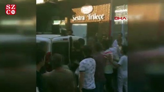 Kadını döven genci, çevredekiler darbetti