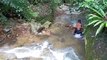 Build a swimming pool at a waterfall by wild people and their daily life