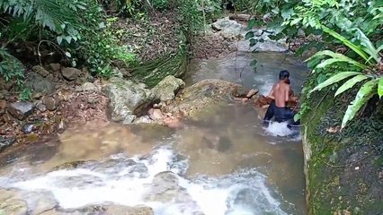 Build a swimming pool at a waterfall by wild people and their daily life