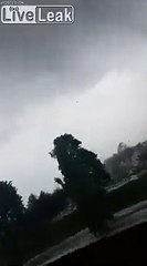 Woman risk it all when tornado hits!