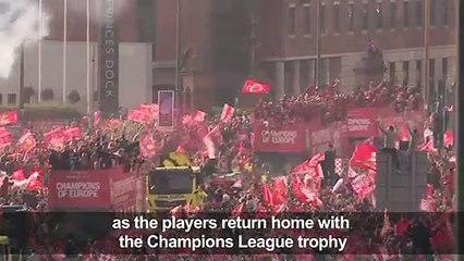 Liverpool fans celebrate Champions League homecoming party