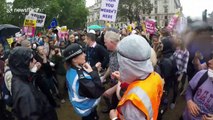Trump supporter MILKSHAKED as protesters shout 'Nazi scum' at London protest