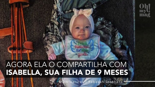 Esta caçadora carrega seu bebê de 9 meses nas costas enquanto mata animais