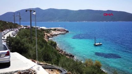 MUĞLA BAKANLIĞIN İŞLETTİĞİ HALK PLAJINA YOĞUN İLGİ