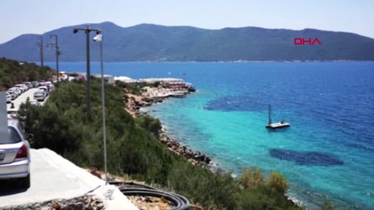 MUĞLA BAKANLIĞIN İŞLETTİĞİ HALK PLAJINA YOĞUN İLGİ