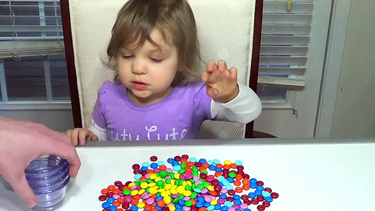 Genevieve Plays with M&M's