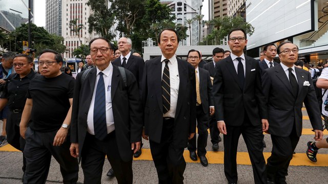 Hong Kong lawyers hold silent march against controversial extradition bill