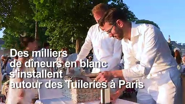 Paris: des milliers de dîneurs en blanc aux Tuileries
