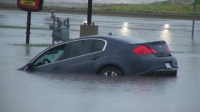 Stranded motorists rescued after flash flooding hits US city