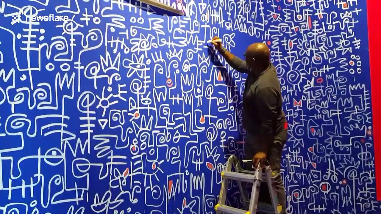 Nigerian artist Victor Ekpuk adds finishing touches to show in London