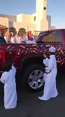 Car decorated with sweets and chocolates on Eid al fitr day by saudi man