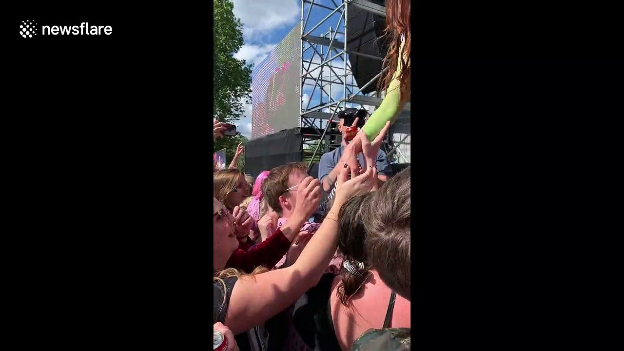Singer Kate Nash crowd surfs on top of fans at London Mighty Hoopla festival